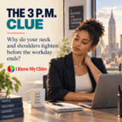 Professional experiencing neck pain from desk work in a Midtown Manhattan office at 3 p.m.